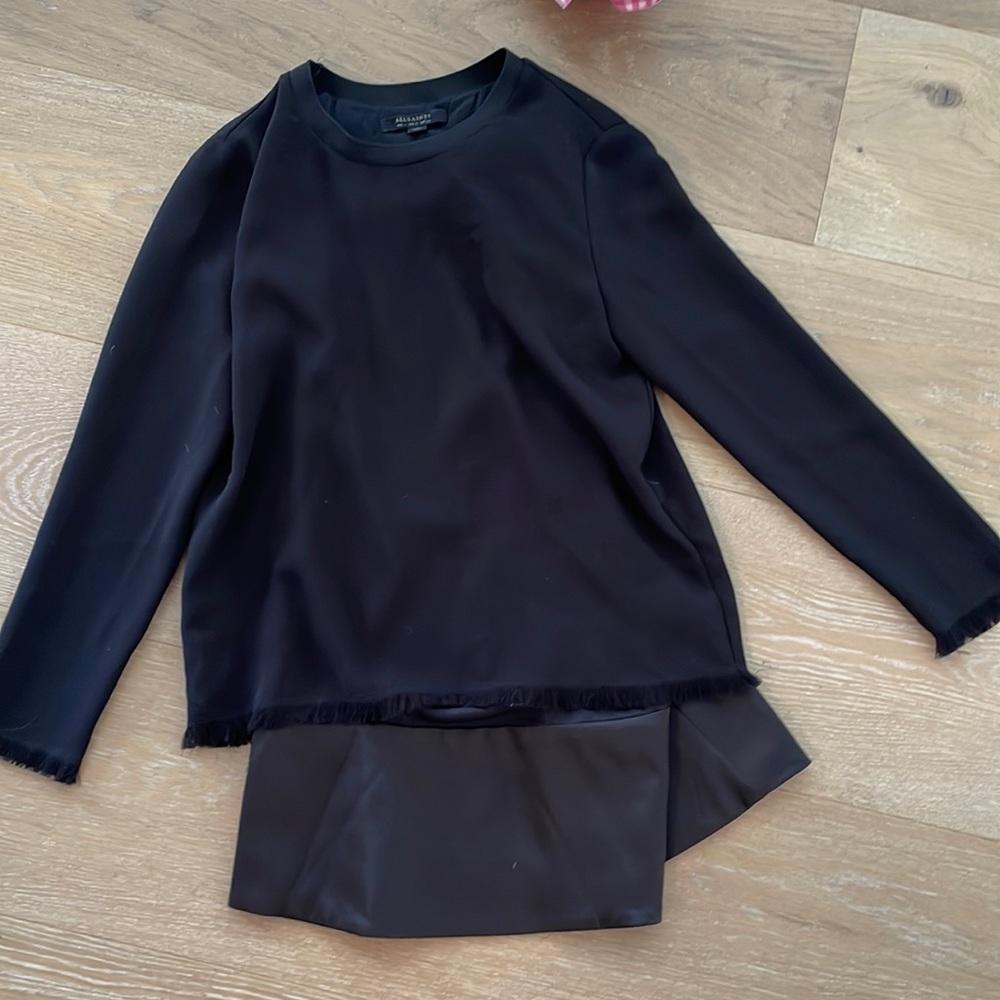 All Saints black long fringe sleeve with under skirt attached.